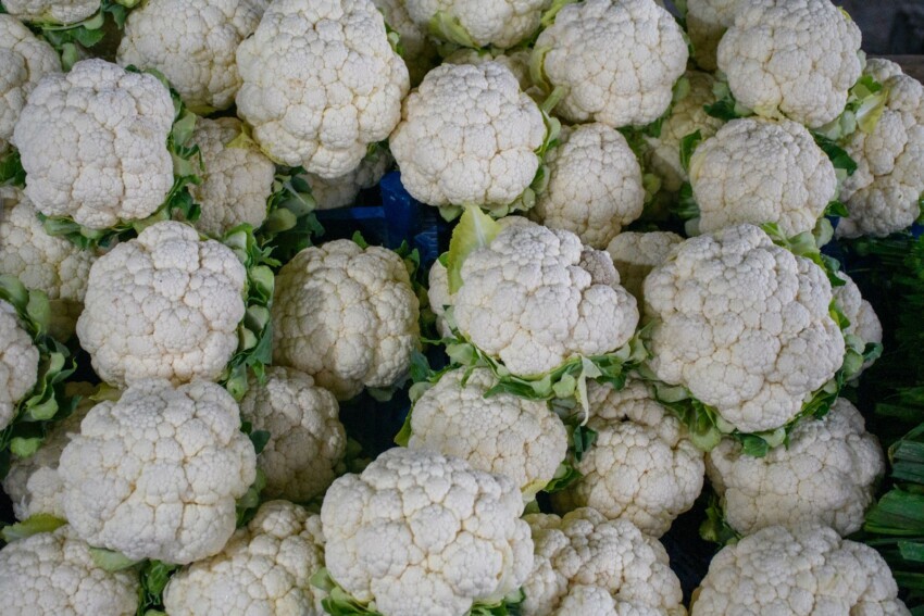 a bunch of cauliflower is piled on top of each other